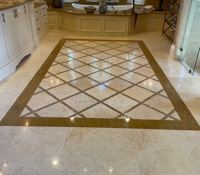 Polished marble entry floor restored by AAA Tile & Marble